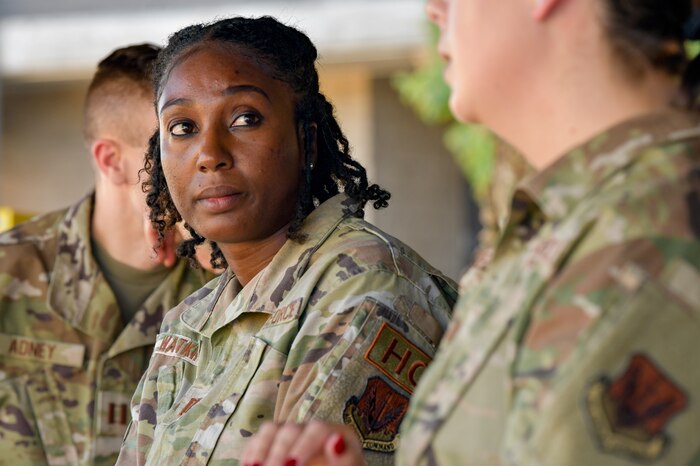 U.S. Air Force Capt. Donsha Watkins, 9th Reconnaissance Wing chaplain, listens to another Airman on Beale Air Force Base, California, Oct. 19, 2023.