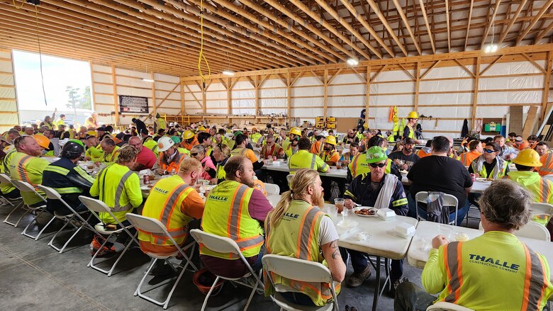 Thalle Construction Company workers enjoy lunch Oct. 17, 2023, while celebrating 500,000 labor hours without a lost-time accident at the Kentucky Lock Addition Project on the Tennessee River in Grand Rivers, Kentucky. (USACE Photo by Vanessa Rudd)
