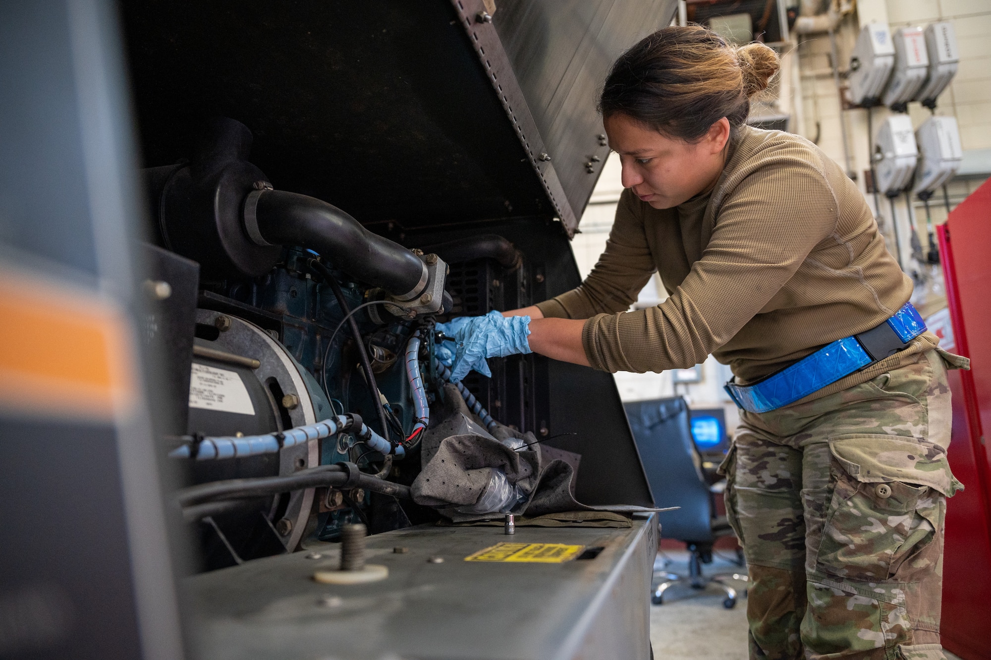 U.S. Air Force Staff Sgt. Melissa Govea, 51st Maintenance Squadron aerospace ground equipment craftsman, conducts maintenance on a FL-1D floodlight at Osan Air Base, Republic of Korea, Oct. 2, 2023. AGE technicians are dedicated to ensuring ground equipment remains consistently reliable, a critical factor in executing flight operations within the 51st Fighter Wing. (U.S. Air Force photo by Staff Sgt. Thomas Sjoberg)