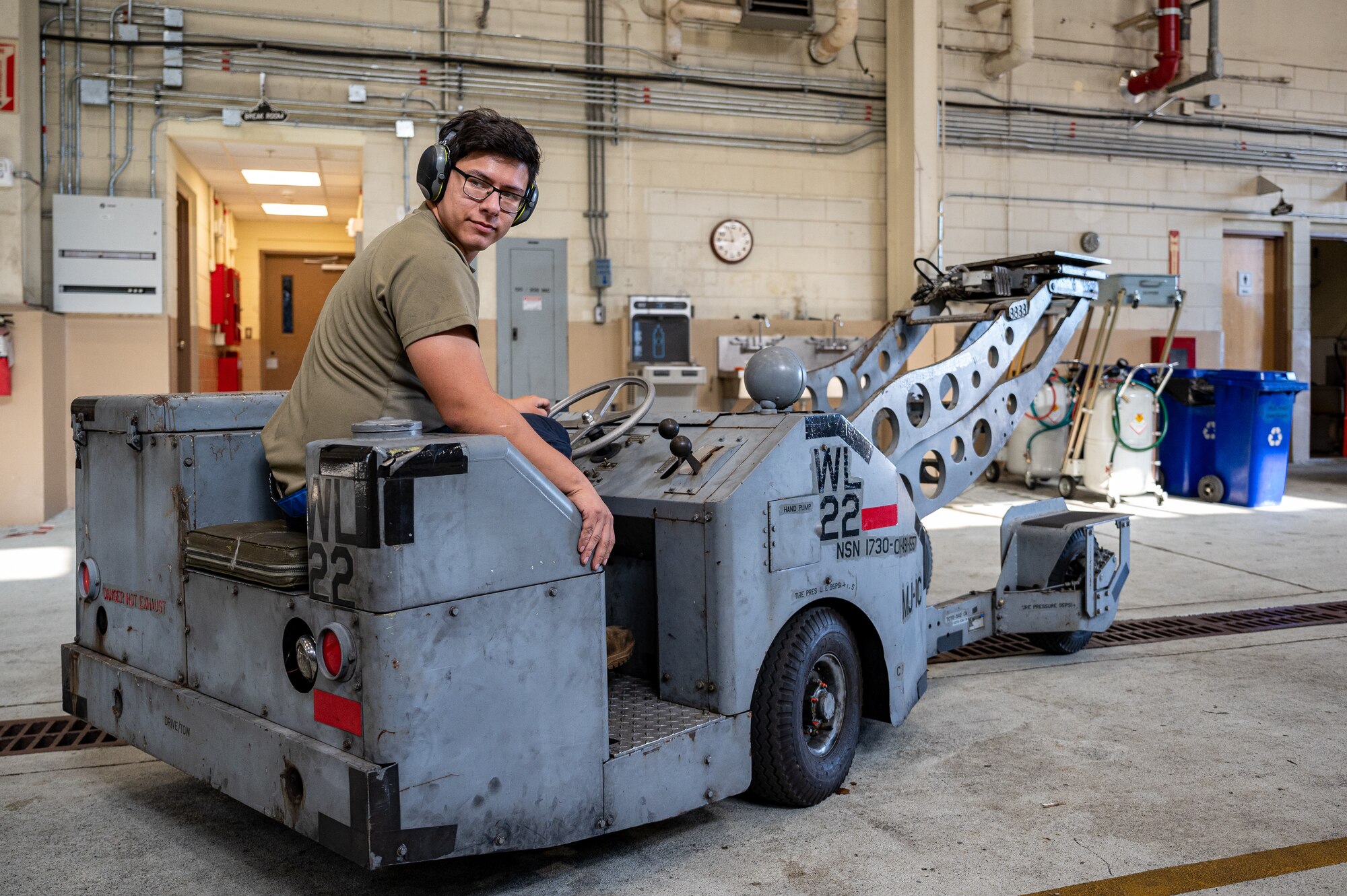 U.S. Air Force Senior Airman Jimi Hernandez, 51st Maintenance Squadron aerospace ground equipment journeyman, conducts a routine inspection on a bomb lift at Osan Air Base, Republic of Korea, Oct. 2, 2023. AGE technicians ensure ground support equipment, like power generators and hydraulic systems, are in optimal condition to support aircraft and keep the 51st Fighter Wing combat-ready. The bomb lifts maintained by AGE technicians are crucial to arming the A-10C Thunderbolt IIs and F-16 Fighting Falcons assigned to the 51st FW, ensuring the ROK remains safe and combat-ready. (U.S. Air Force photo by Staff Sgt. Thomas Sjoberg)