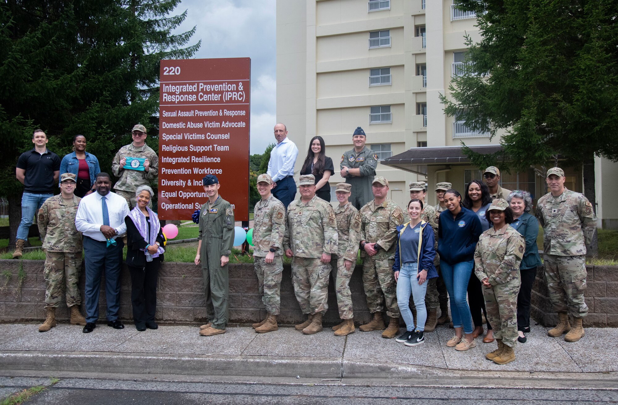 U.S. Air Force 35th Fighter Wing leadership stand with members of the helping agency during a ribbon cutting ceremony at Misawa Air Base, Japan, Oct. 5, 2023.