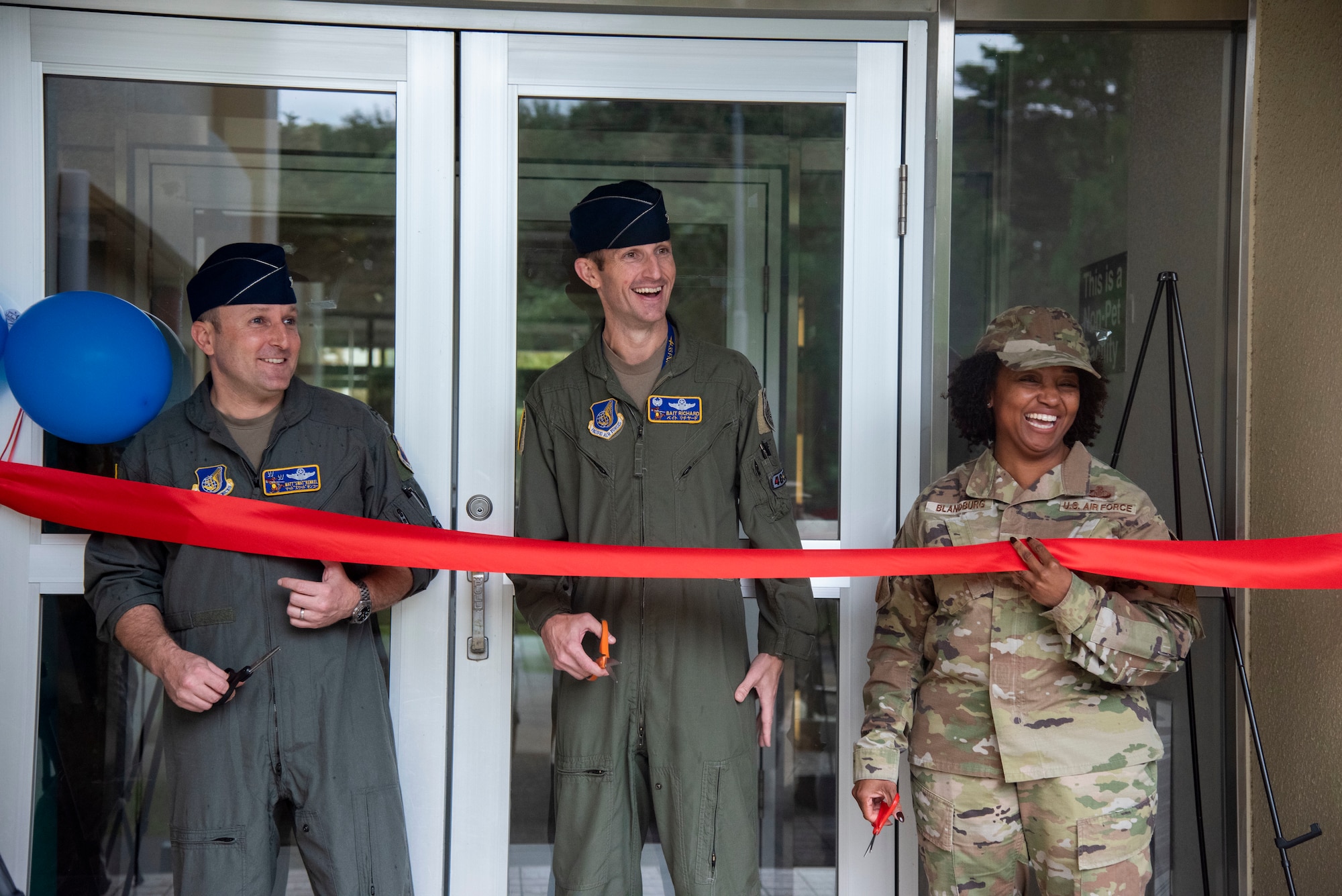 U.S. Air Force 35th Fighter Wing leadership celebrates with the crowd during a ribbon cutting ceremony at Misawa Air Base, Japan, Oct. 5, 2023.