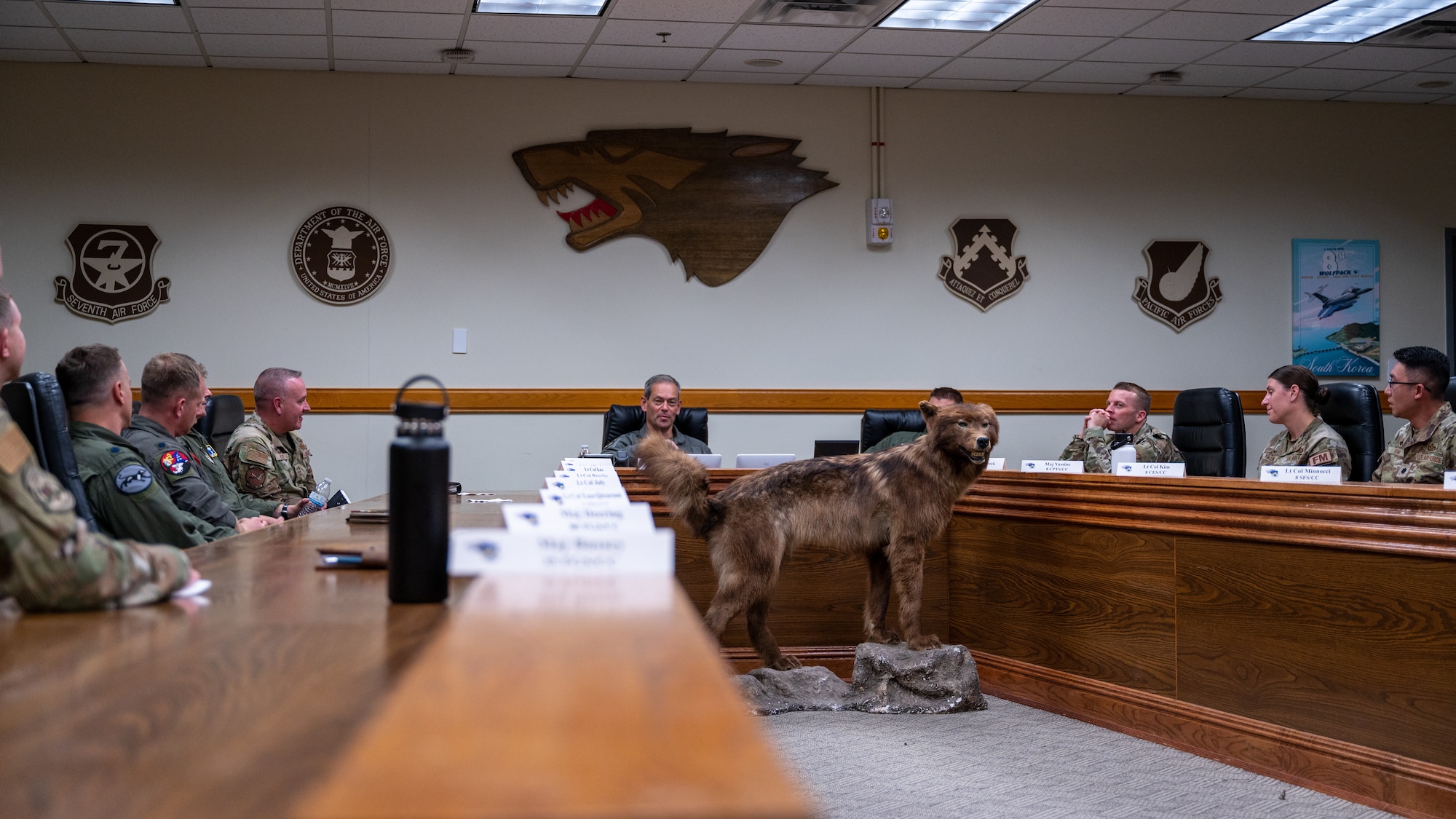 Gen. Ken Wilsbach speaks to wing leadership after recognizing several Airmen.