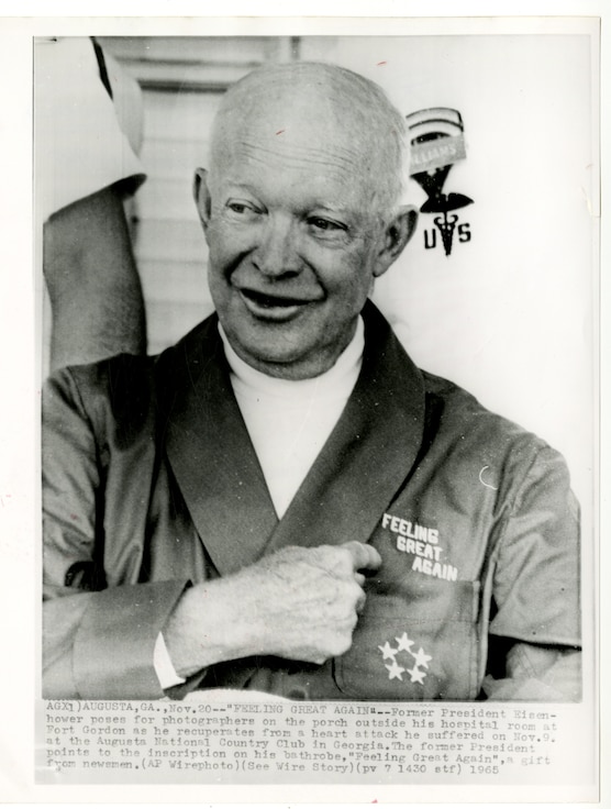President Eisenhower talks with reporters from outside his hospital room on Fort Gordon.