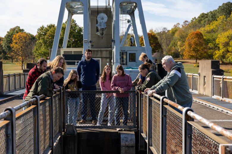 In a convergence of academia and real-world engineering, a group of students from the University of Pittsburgh’s Hydrologic Analysis and Design course explored the Conemaugh River Dam to expand their engineer learning beyond conventional classroom boundaries. University of Pittsburgh students view the Conemaugh River Dam from the top looking down as April Richards, a park ranger with the U.S. Army Corps of Engineers Pittsburgh District, explains the dam’s construction in Saltsburg, Pennsylvania, Oct. 13, 2023.