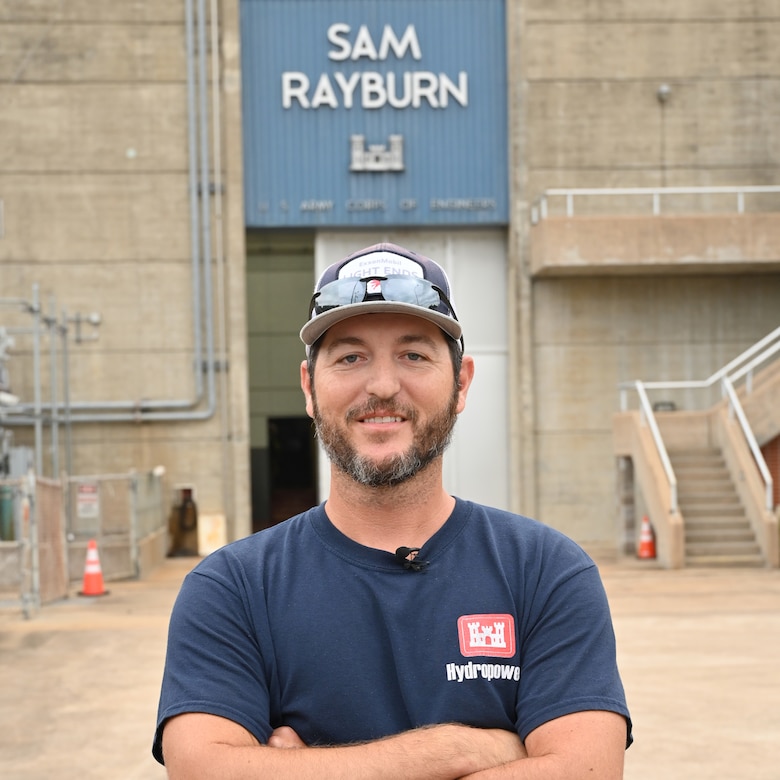 Person in front of a dam