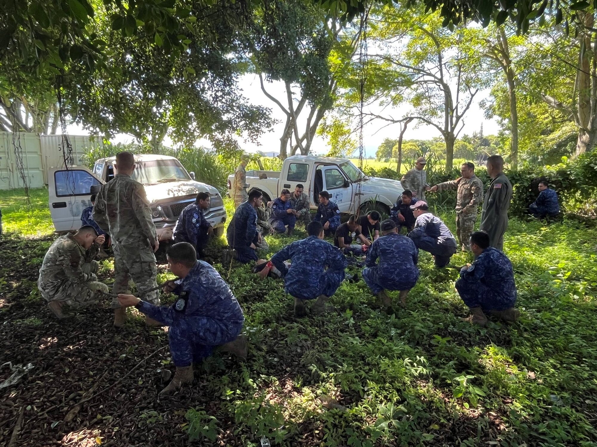 Members of the 571 Mobility Support Advisory Squadron stationed at Travis Air Force Base, California, conduct a field training exercise with Fuerza Aérea Salvadoreña (FAS) Airmen during El Salvador Mobile Training Team 23-22, Sept. 12, 2023, Ilopango International Airport, San Salvador.