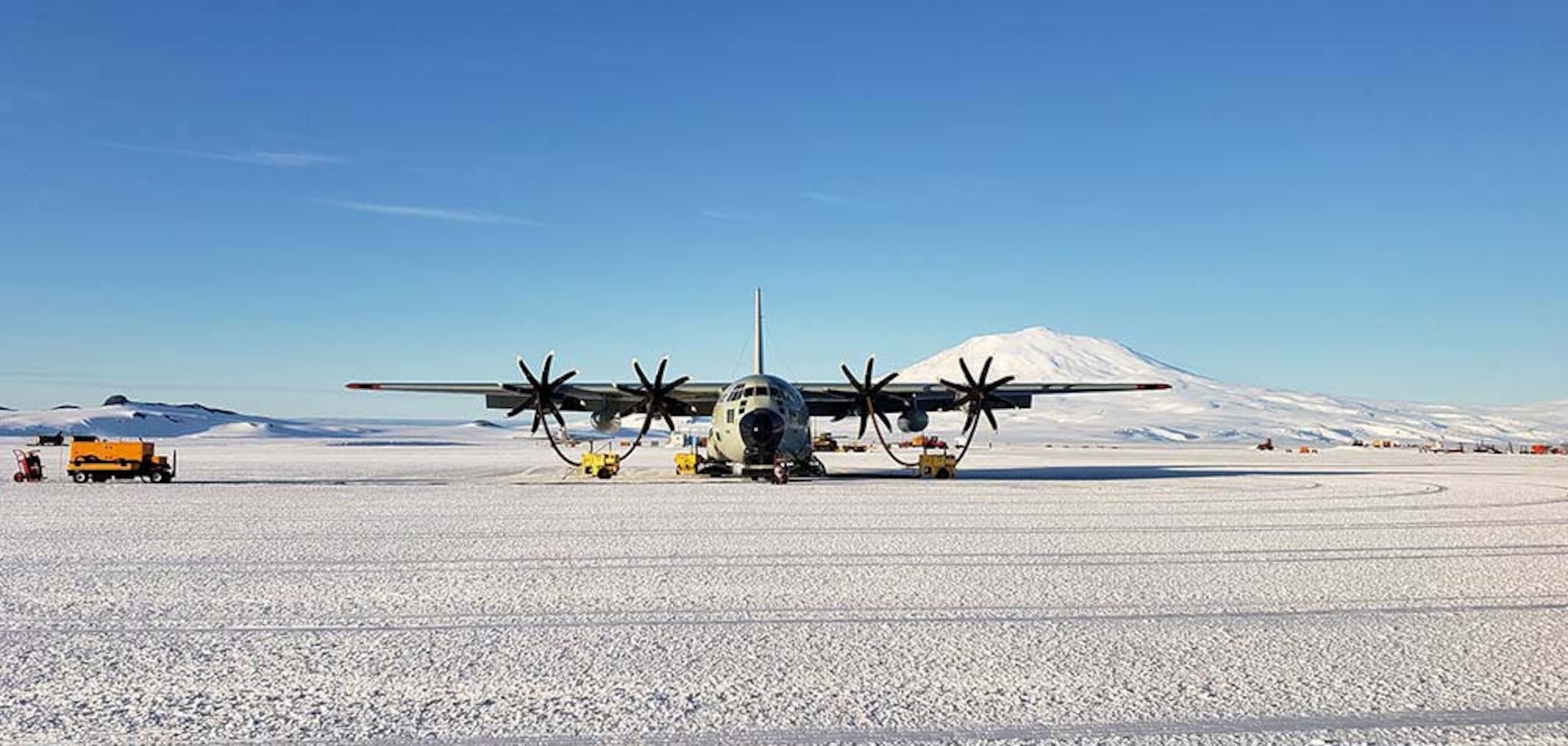 An LC-130 "Skibird" assigned to the New York Air National Guard's 109th Airlift Wing sits at on the skiway at Willliams Field, Antarctica, Feb. 6, 2020. The New York Air National Guard's 109th Airlift Wing flies the largest ski-equipped aircraft in the world and supports Antarctic research.