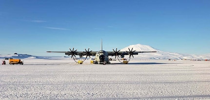 An LC-130 "Skibird" assigned to the New York Air National Guard's 109th Airlift Wing sits at on the skiway at Willliams Field, Antarctica, Feb. 6, 2020. The New York Air National Guard's 109th Airlift Wing flies the largest ski-equipped aircraft in the world and supports Antarctic research.