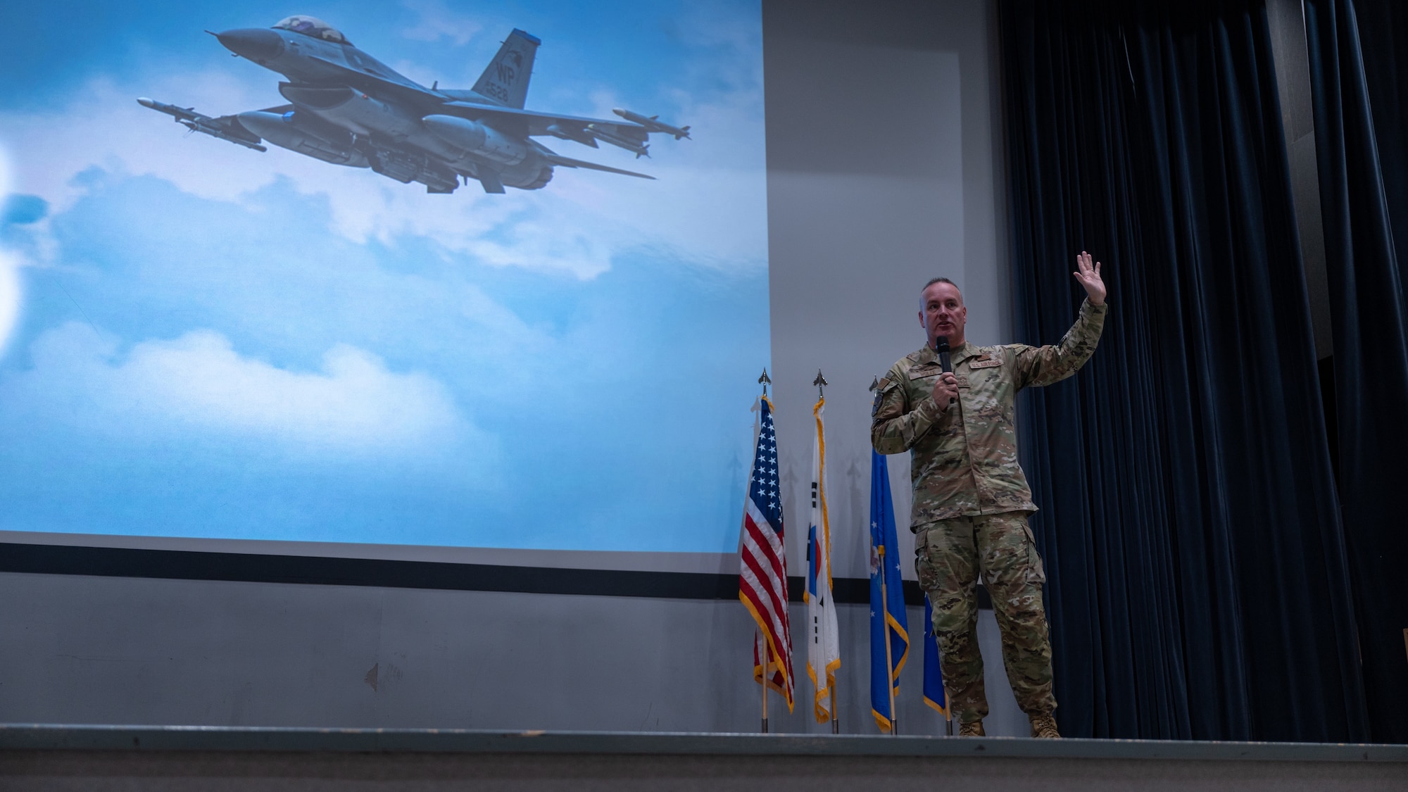 Chief Master Sgt. David Wolfe speaks to members of the 8th Fighter Wing about the unique challenges Kunsan presents for families.