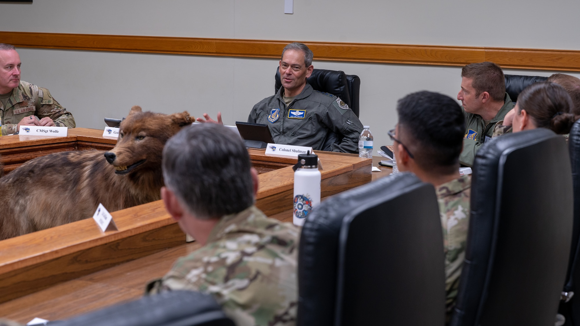 Gen. Ken Wilsbach speaks to wing leadership after recognizing several Airmen.