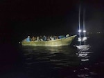 An unlawful irregular migration voyage is interdicted Oct. 23, 2023, by Caribbean Border Interagency Group partner agencies off the west coast of Aguadilla, Puerto Rico.  Coast Guard Cutter Heriberto Hernandez repatriated 14 of the 15 migrants to Dominican Republic, while one other migrant is in federal custody facing federal prosecution for attempting to re-enter illegally into the United States. (U.S. Coast