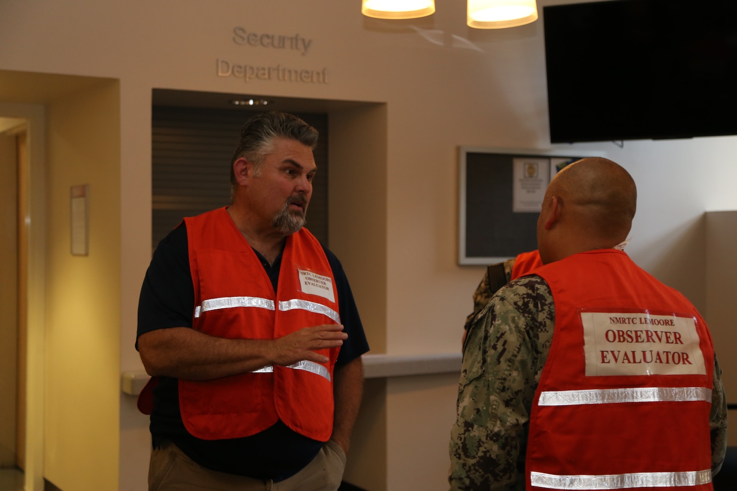 Naval Health Clinic Lemoore's Emergency Manager Karl Kassner, briefs the observation and evaluation team about The Great ShakeOut.