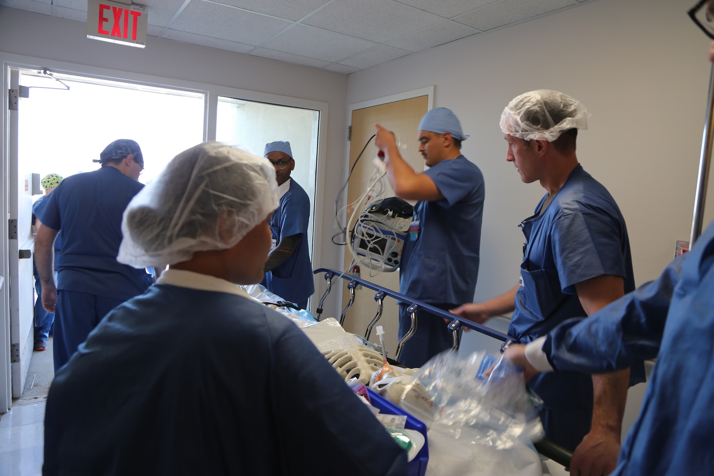 The Naval Health Clinic Lemoore ambulatory procedure unit (APU) and main operating room (MOR) evacuate 'Mr. Bones' during The Great ShakeOut.