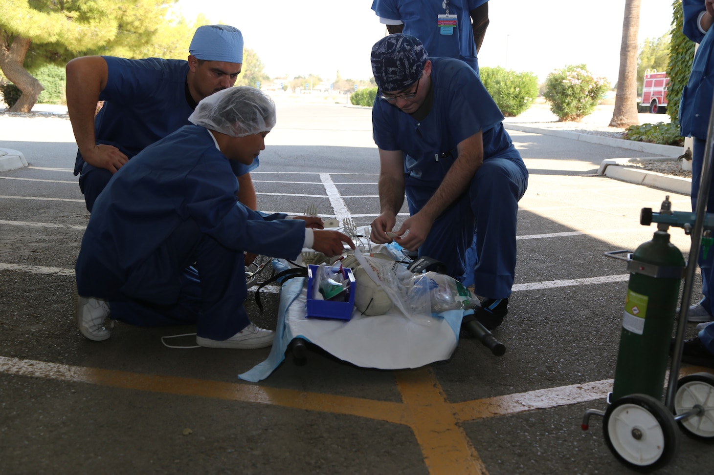 The Naval Health Clinic Lemoore ambulatory procedure unit (APU) and main operating room (MOR) evacuate 'Mr. Bones' during The Great ShakeOut.