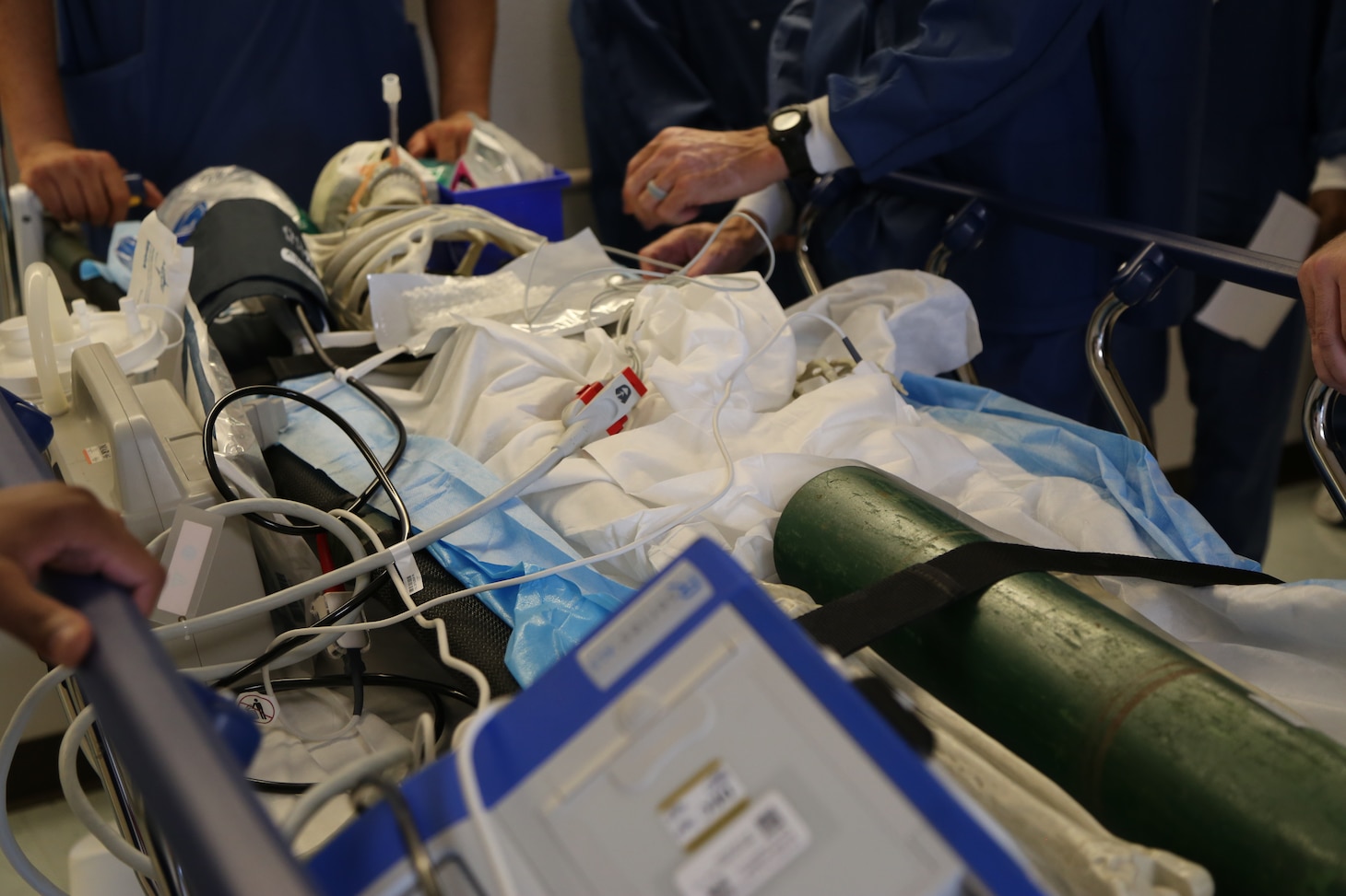 The Naval Health Clinic Lemoore ambulatory procedure unit (APU) and main operating room (MOR) evacuate 'Mr. Bones' during The Great ShakeOut.