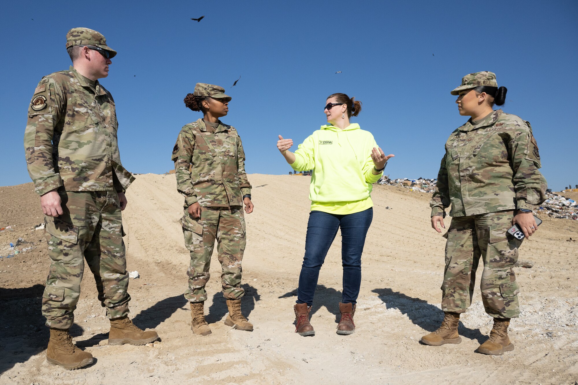 Lynsey Baer, second from the right, Delaware Solid Waste Authority chief engineer, gives Chief Master Sgt. Carolyn Russell, 436th Airlift Wing command chief and her team, a tour of a sanitary landfill at the Central Solid Waste Management Center in Felton, Delaware, Oct. 19, 2023. The command chief visited the center with members of her staff to gain a better understanding of solid waste management and increase recycling efforts on Dover Air Force Base. (U.S. Air Force photo by Mauricio Campino)