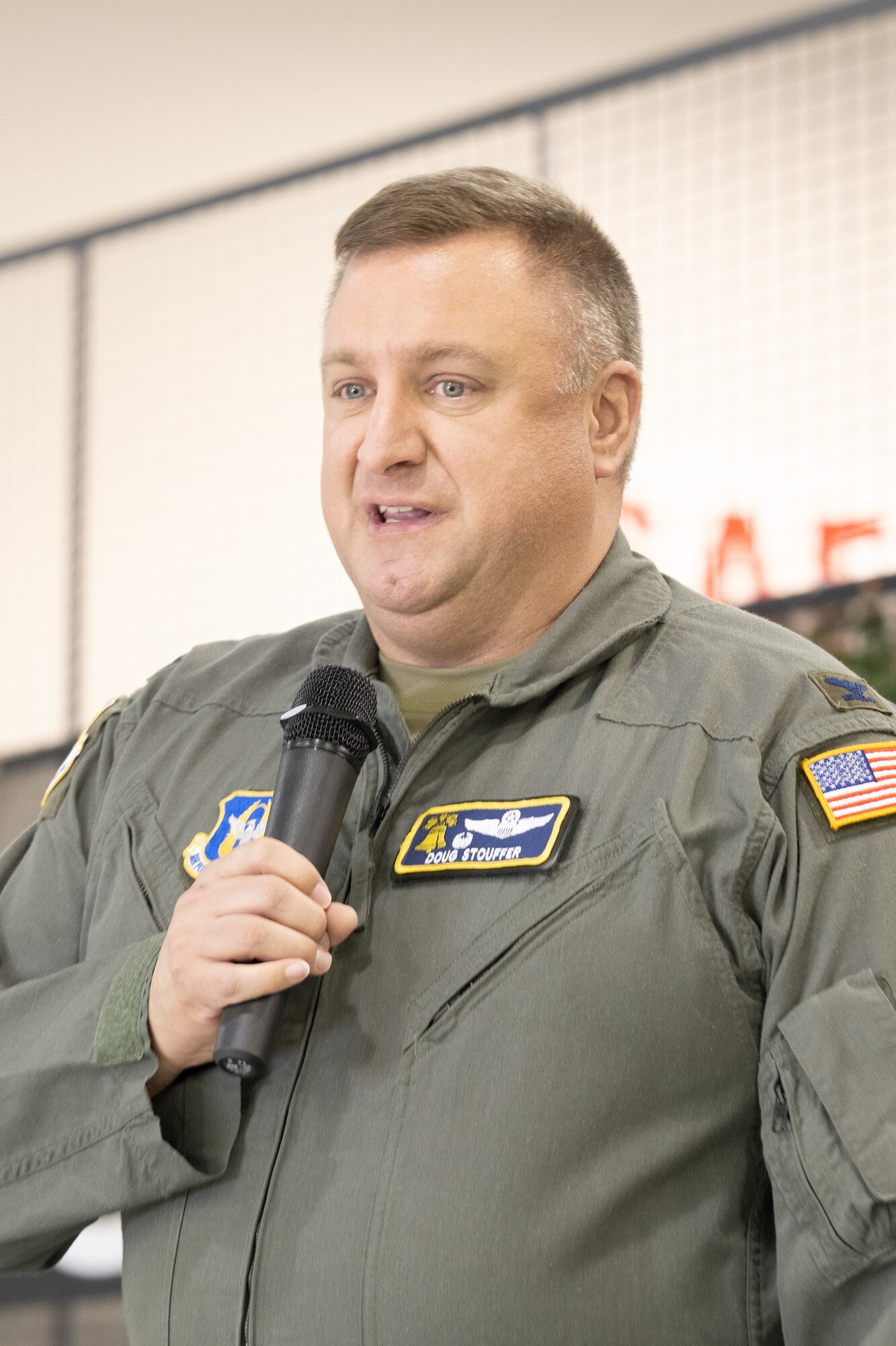 Col. Douglas Stouffer, 512th Airlift Wing commander, provides opening remarks at the 2024 Honorary Commander Induction Ceremony at Dover Air Force Base, Delaware, Oct. 20, 2023. Established in 1992, the Dover AFB HCC program is a community outreach effort that builds upon the great relationships between local civic leaders and Dover AFB personnel. (U.S. Air Force photo by Mauricio Campino)