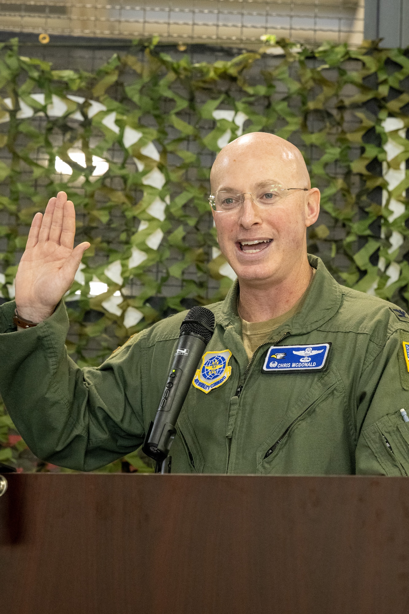 Col. Chris McDonald, 436th Airlift Wing commander, administers the Honorary Commander Oath during the 2024 HCC Induction Ceremony at Dover Air Force Base, Delaware, Oct. 20, 2023. This year 43 local civic and business leaders were inducted into the HCC program. (U.S. Air Force photo by Mauricio Campino)