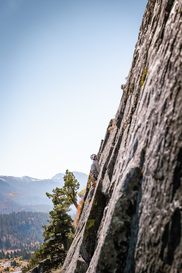 A U.S. Marines with 2nd Battalion, 5th Marine Regiment, 1st Marine Division, climb a cliff face during Mountain Leaders Course as part of Mountain Training Exercise 1-24 at Marine Corps Mountain Warfare Training Center, Bridgeport, California, Oct. 11, 2023. MCMWTC specializes in mountain warfare training, providing a unique and ideal opportunity to rehearse operations in a mountainous environment. (U.S. Marine Corps photo by Lance Cpl. Richard PerezGarcia)