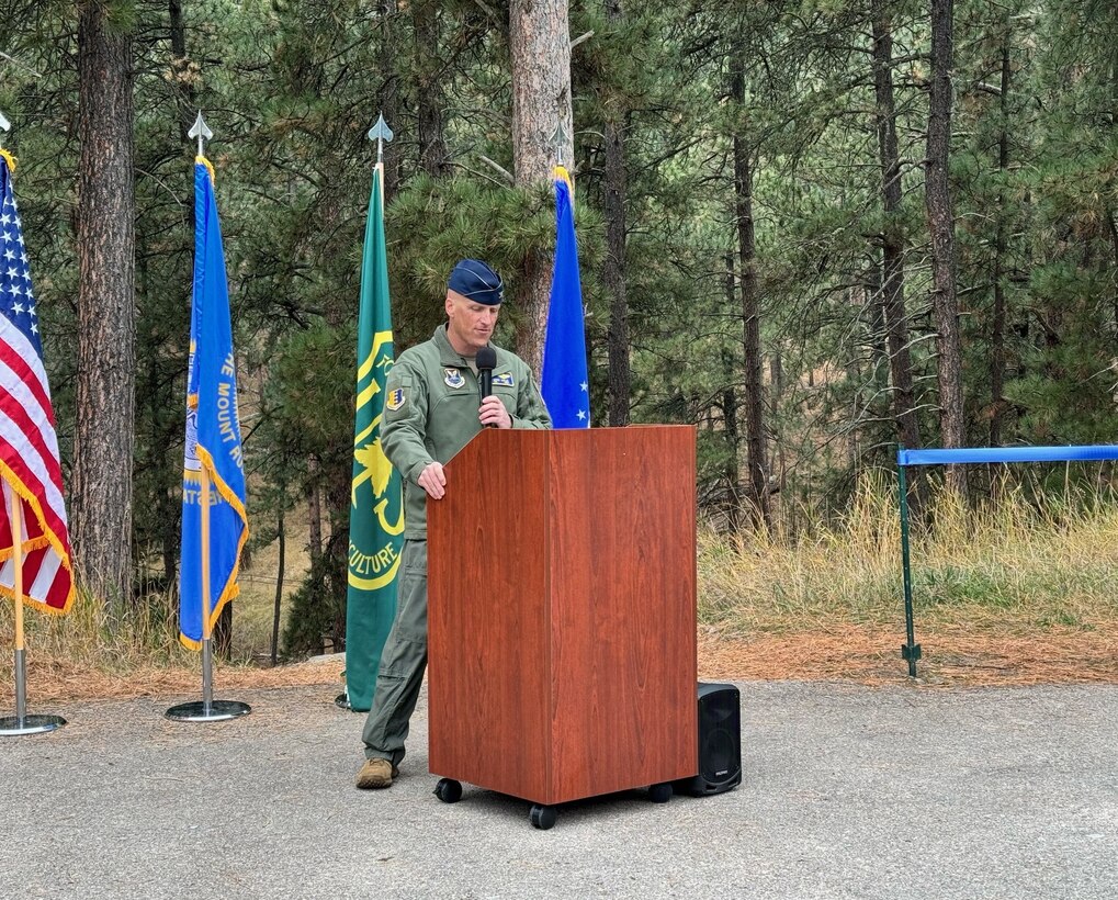 Col. Derek Oakley, 28th Bomb Wing commander, provides remarks during the Veteran’s Point Trailhead Partnership dedication at Pactola Reservoir, South Dakota, October 24, 2023.
