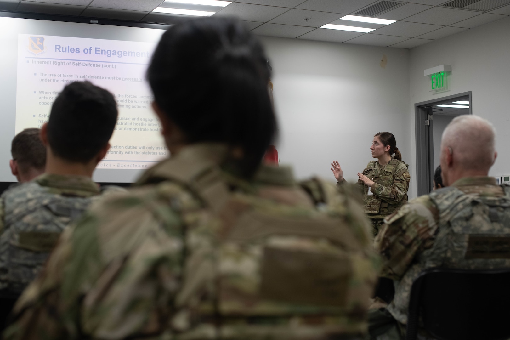 Airmen receive a deployment brief.