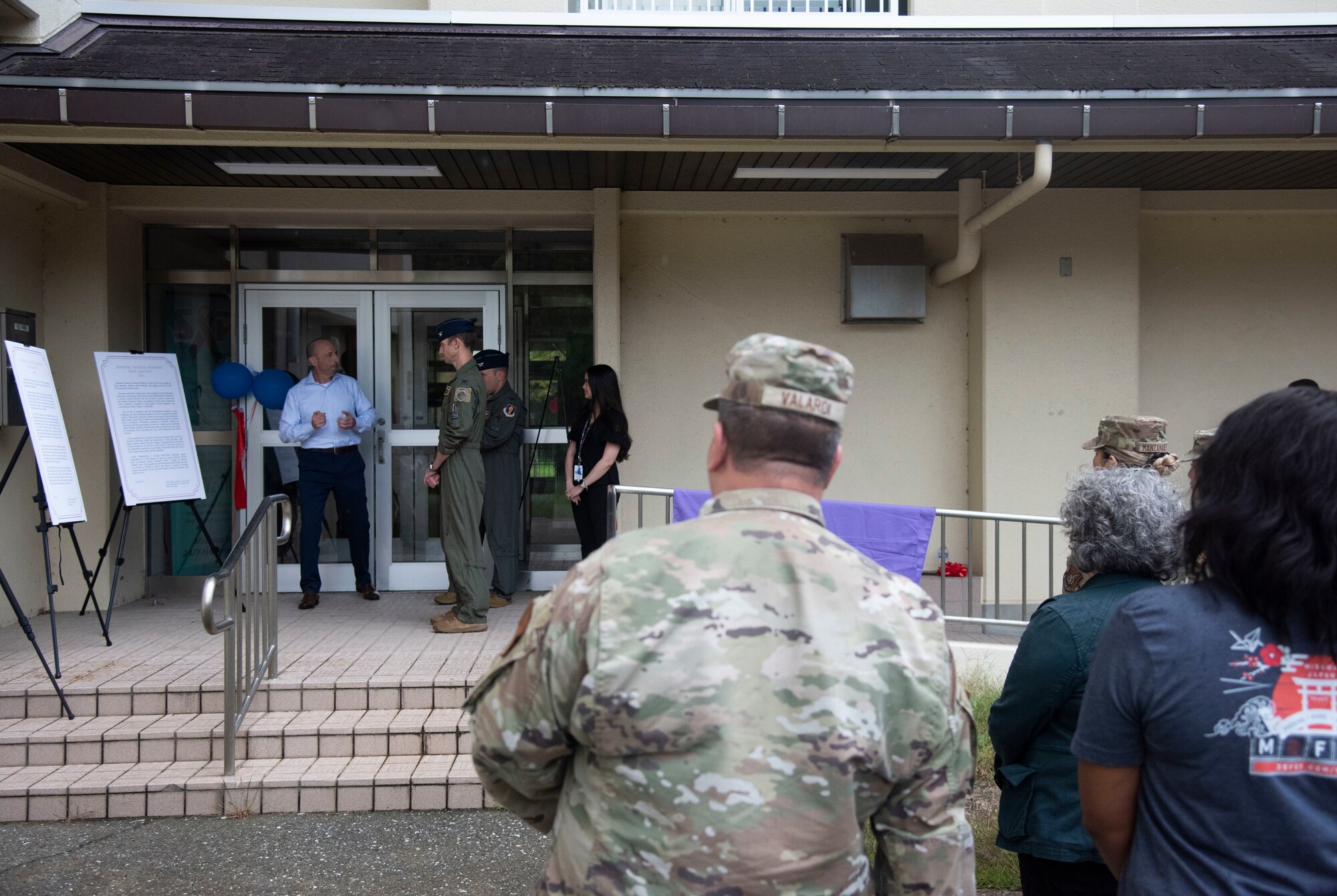 U.S. Air Force Col. Michael Richard, 35th Fighter Wing commander, and Col. Matthew Kenkel, 35th FW deputy commander, listens to an introduction during a Domestic Violence Awareness Proclamation signing at Misawa Air Base, Japan, Oct. 5, 2023.