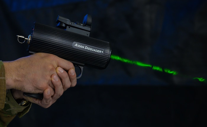 Someone holding laser