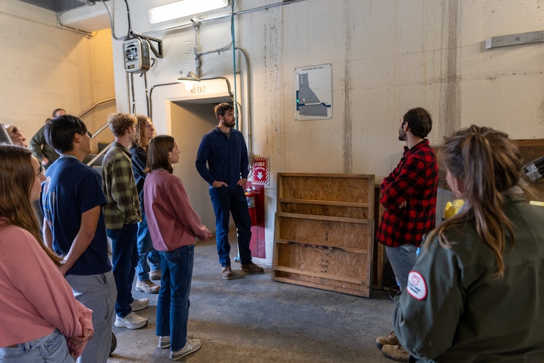 In a convergence of academia and real-world engineering, a group of students from the University of Pittsburgh’s Hydrologic Analysis and Design course explored the Conemaugh River Dam to expand their engineer learning beyond conventional classroom boundaries. University of Pittsburgh students look at the Conemaugh River Dam diagram as April Richards, a park ranger with the U.S. Army Corps of Engineers Pittsburgh District, explains the key locking of the dam’s construction in Saltsburg, Pennsylvania, Oct. 13, 2023.