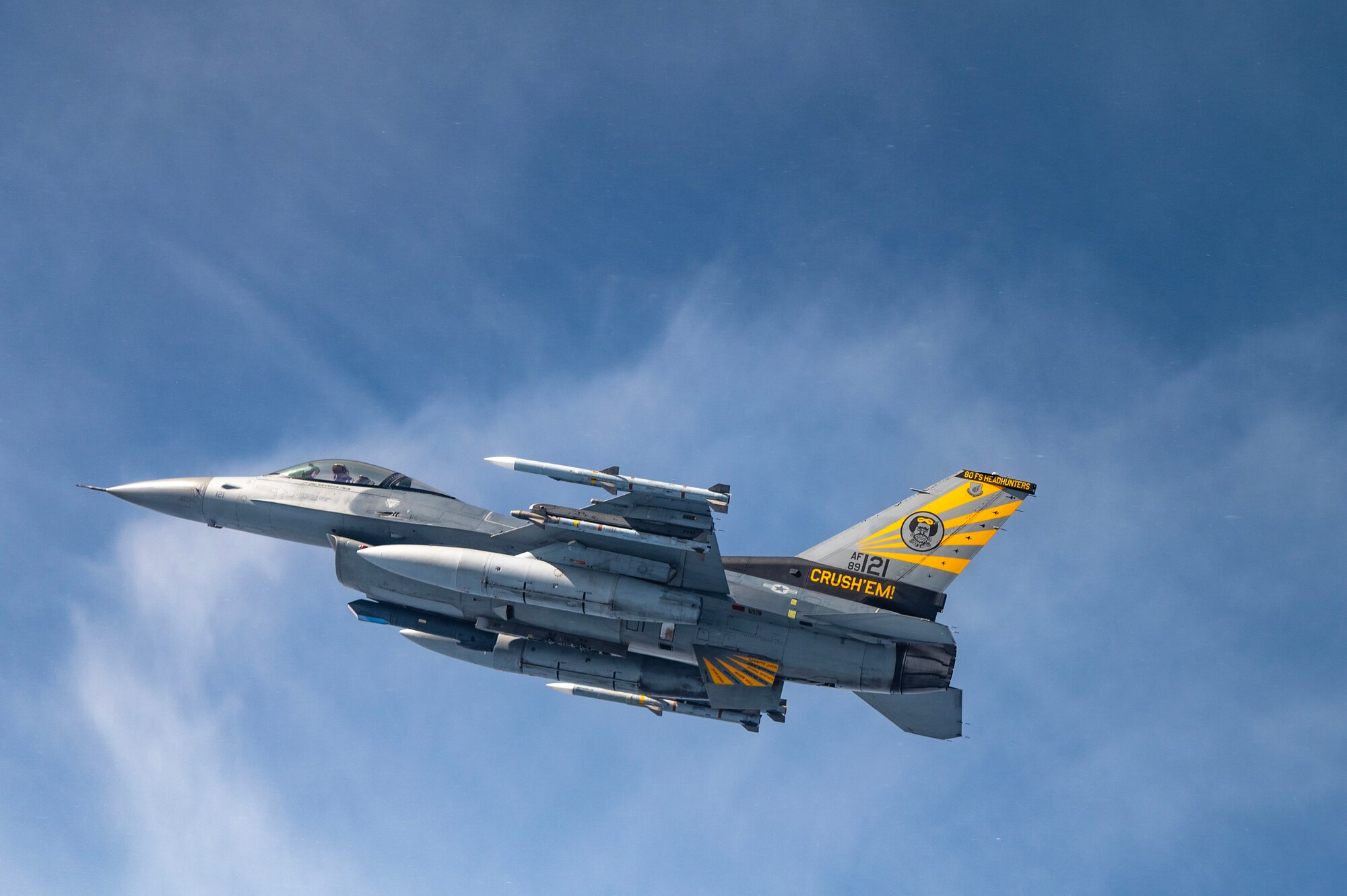 A U.S. Air Force F-16 Fighting Falcon soars over the Republic of Korea's southern coast.