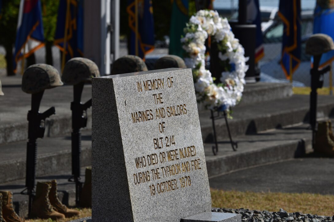 A picture of the Camp Fuji Fire Memorial Monument during the memorial ceremony commemorating the deadly 1979 fire, that claimed 13 lives and injured dozens stationed and working at CATC Camp Fuji, Japan. (U.S. Marine Corps photo by Song Jordan)