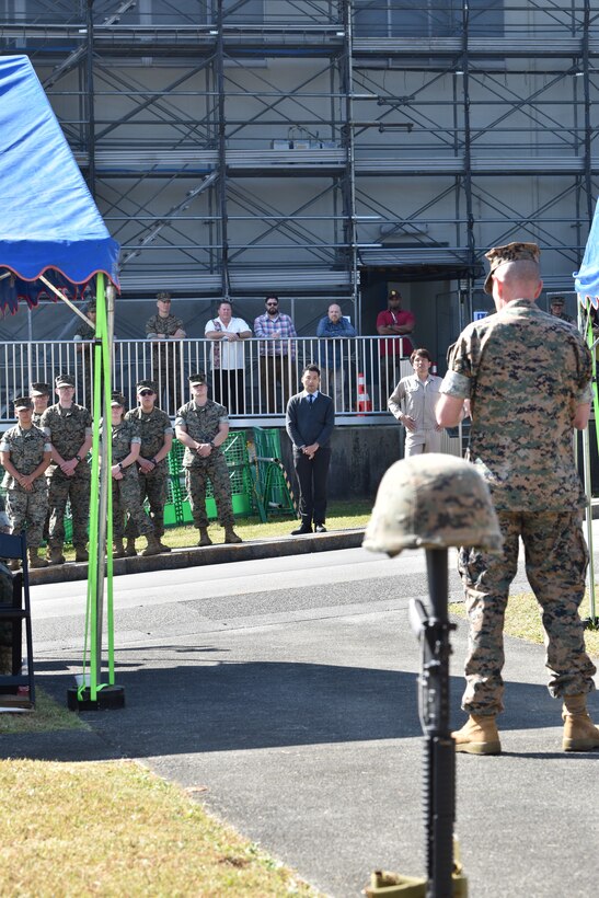 Colonel Neil J. Owens, Commanding Officer of Combined Arms Training Center, Camp Fuji, stands before memorial attendees, October 20, 2023. Members of the community gathered to honor the men who died and the dozens of people injured due to a fire that broke out on the installation in 1979. (U.S. Marine Corps photo by Song Jordan)