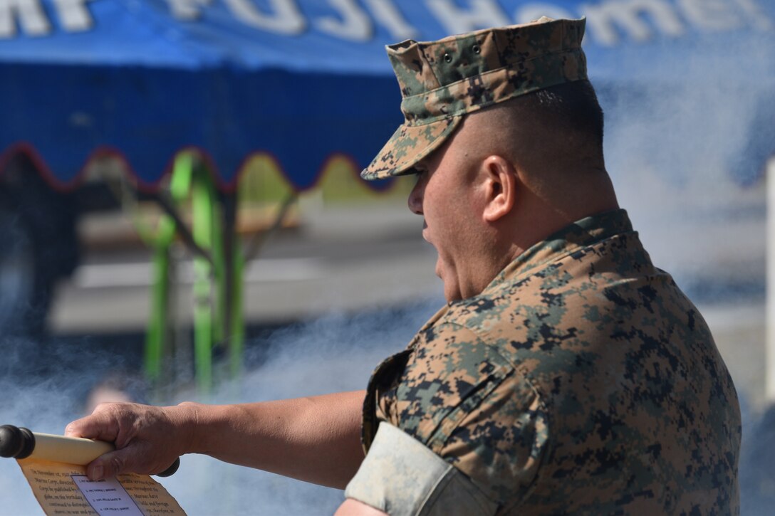 Sergeant Major Restituto Paz, Combined Arms Training Center, Camp Fuji's sergeant major, calls roll during the 1979 fire memorial ceremony, October 20, 2023. (U.S. Marine Corps photo by Song Jordan)