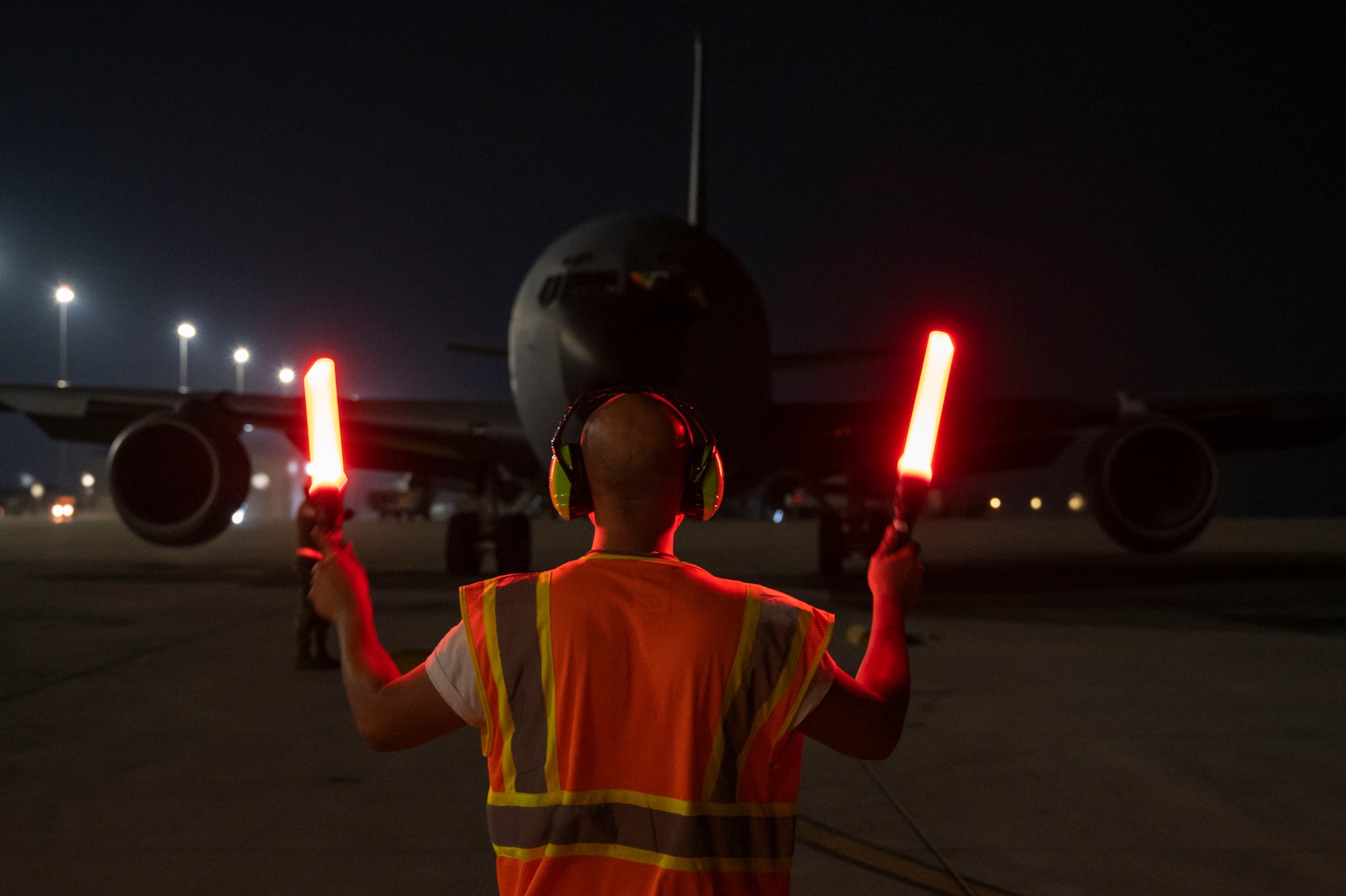 Airman taxis aircraft.