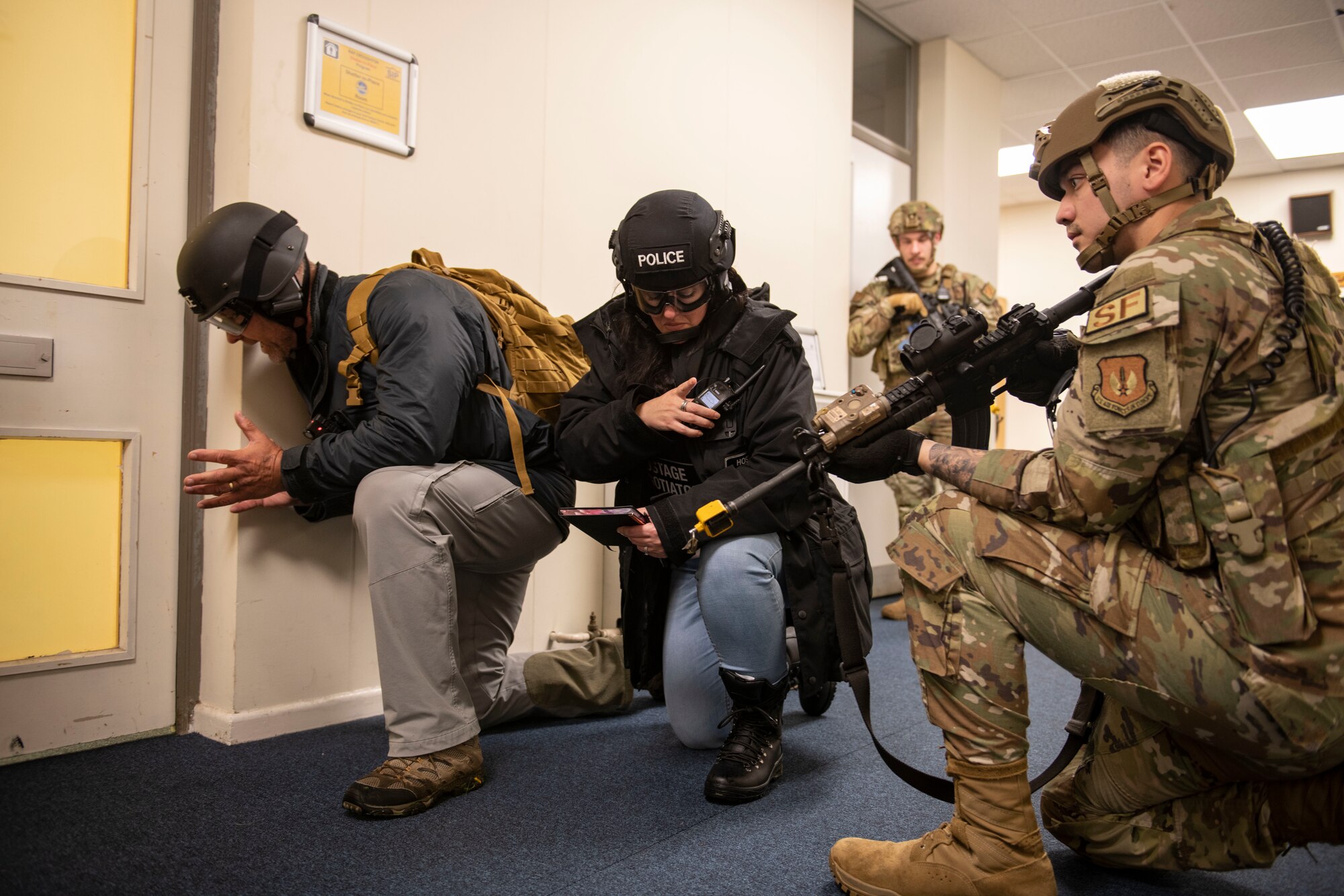 Northamptonshire Police hostage negotiators communicate with a simulated active shooter during an exercise at RAF Croughton