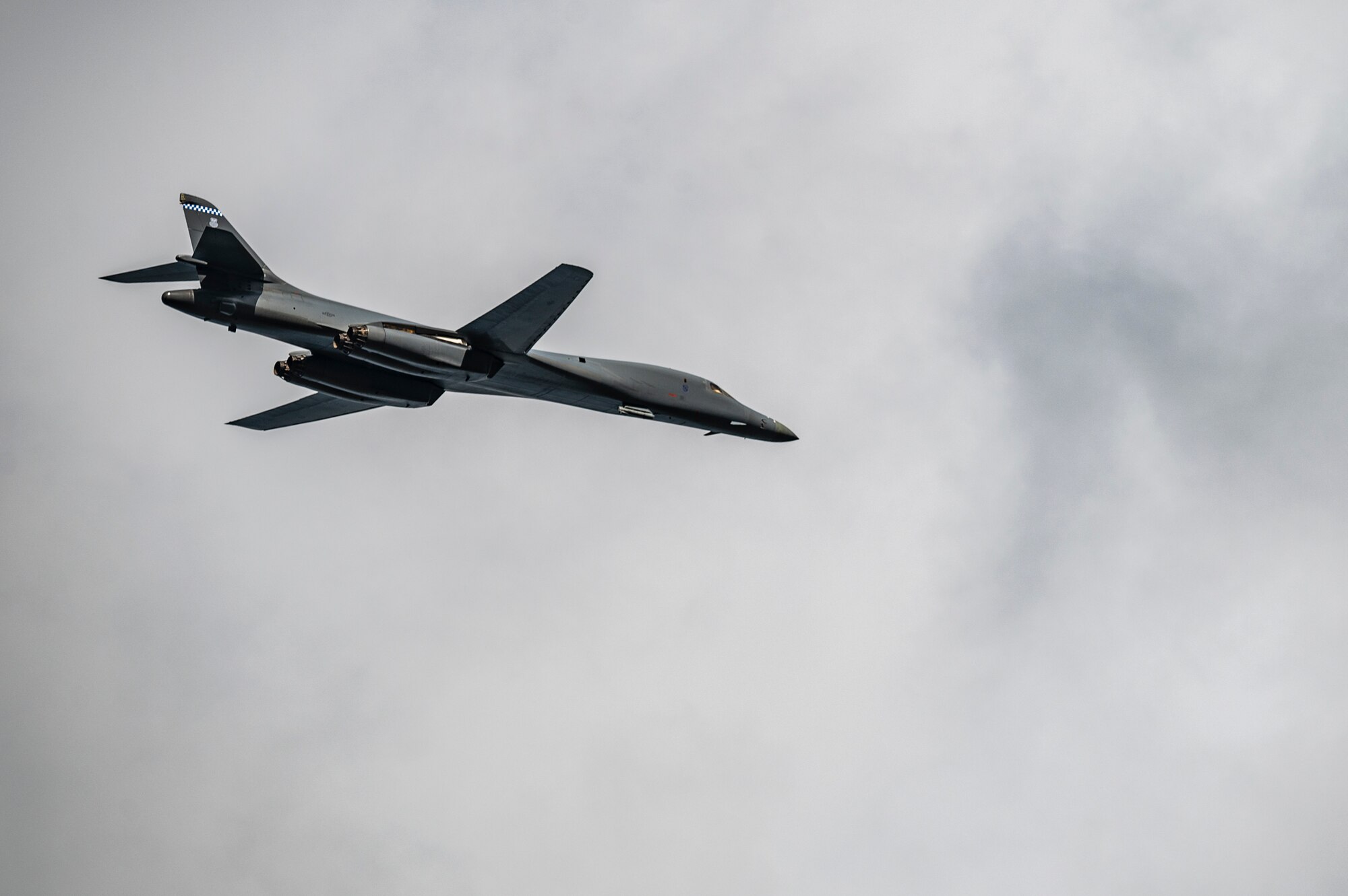 A B-1B Lancers assigned to the 9th Expeditionary Bomb Squadron flies over RAF Fairford, United Kingdom, Oct. 24, 2023. U.S. Strategic Command Bomber Task Force missions provide opportunities to train and work with our Allies and partners in joint and combined operations and exercises. (U.S. Air Force Photo by Senior Airman Ryan Hayman)