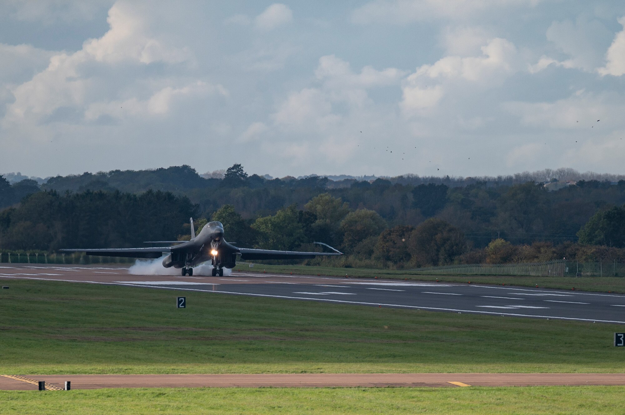 A B-1B Lancer assigned to the 9th Expeditionary Bomb Squadron lands at RAF Fairford, United Kingdom, Oct. 24, 2023. Our ability to quickly respond and assure Allies and Partners rests upon the fact that we are here, in Europe, forward and ready. (U.S. Air Force Photo by Senior Airman Ryan Hayman)
