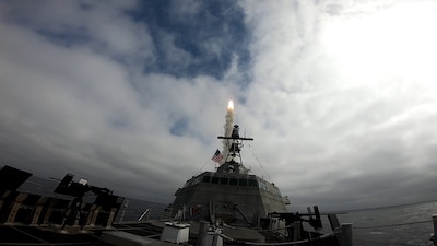 USS Savannah (LCS 28) launches an SM-6 missile during a live-fire demonstration in the eastern Pacific Ocean.