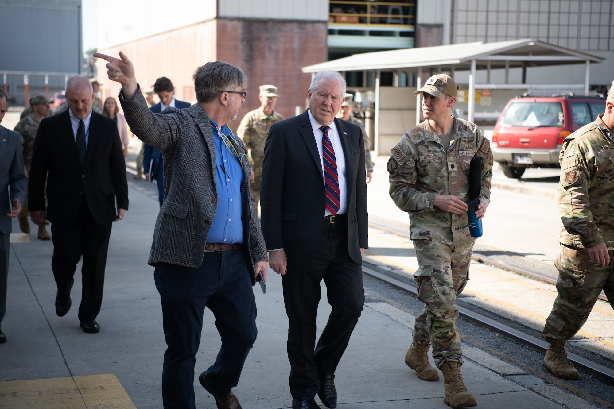 Secretary of the Air Force Frank Kendall, center, listens as Scott Meredith, technical director of the Arnold Engineering Development Complex 716th Test Squadron, left, discusses the aerodynamic test capabilities of the 716TS. During Kendall’s Oct. 4, 2023, visit to Arnold, headquarters of AEDC, he observed some base operations, toured several facilities and received overviews of current and planned AEDC test capabilities. Also pictured to Kendall’s left is Lt. Col. James Gresham, commander of the 716TS. (U.S. Air Force photo by Keith Thornburgh)
