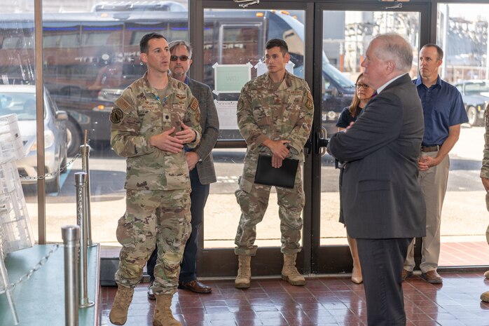 Lt. Col. James Gresham, commander of the Arnold Engineering Development Complex 716th Test Squadron, left, discusses aerodynamic test capabilities of the 716TS with Secretary of the Air Force Frank Kendall during Kendall’s Oct. 4, 2023, visit to Arnold Air Force Base, Tenn. During his time at Arnold, headquarters of AEDC, Kendall observed some base operations, toured several facilities and received overviews of current and planned AEDC test capabilities. (U.S. Air Force photo by Keith Thornburgh)