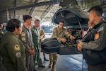 Hawaii Army National Guard 1st Sgt. Clayton Perreira, Charlie Company, 1st Battalion, 183rd Aviation Regiment commander, conducts a standardization subject matter expert exchange with the Philippine Air Force at Brigadier General Benito N. Ebuen Air Base, Lapu-Lapu City, Philippines, Sept. 27, 2023.