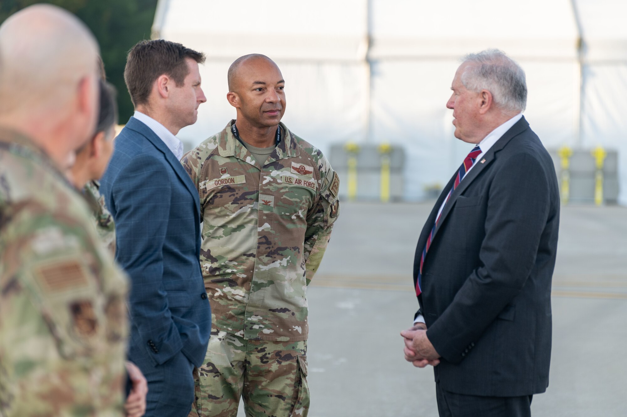 Secretary of the Air Force Frank Kendall, right, speaks with Arnold Engineering Development Complex Commander Col. Randel Gordon, directly to Kendall’s right, following his arrival at Arnold Air Force Base, Tenn., Oct. 4, 2023. During his visit to Arnold, headquarters of AEDC, Kendall observed some base operations, toured several facilities and received overviews of current and planned AEDC test capabilities. (U.S. Air Force photo by Keith Thornburgh)