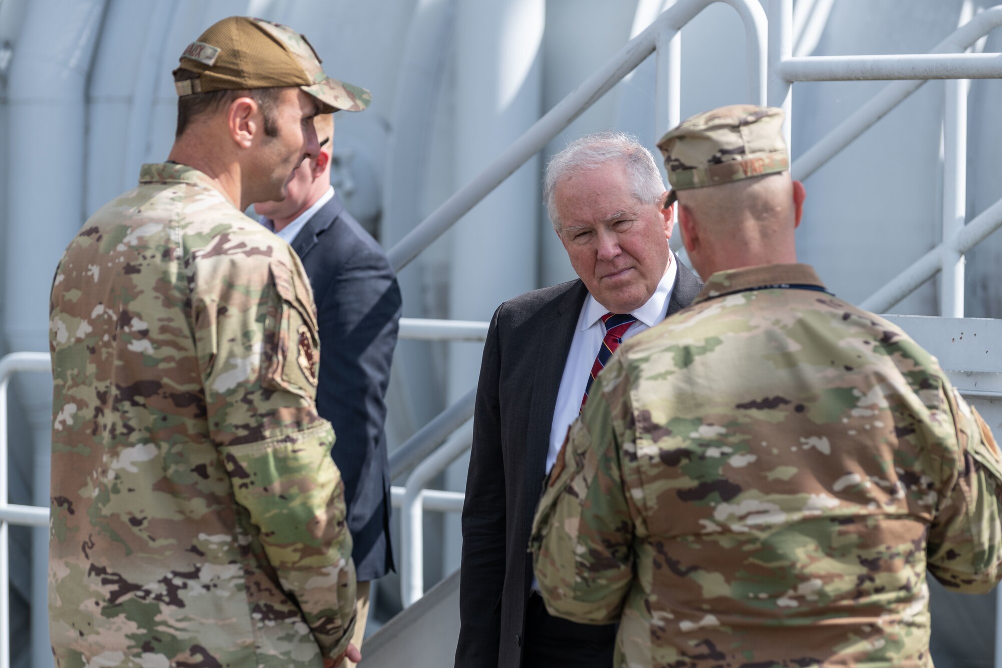 Secretary of the Air Force Frank Kendall, center, speaks with Col. Jason Vap, commander of the Arnold Engineering Development Complex 804th Test Group, right, and Lt. Col. Bradley Breaux, commander of the AEDC 718th Test Squadron, during his Oct. 4, 2023, visit to Arnold Air Force Base, Tenn. During his time at Arnold, headquarters of AEDC, Kendall observed some base operations, toured several facilities and received overviews of current and planned AEDC test capabilities. (U.S. Air Force photo by Keith Thornburgh)