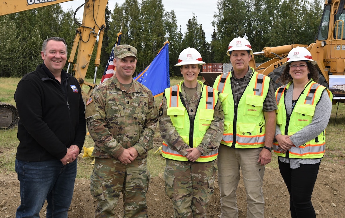 Alaska District staff pose for a photo after a groundbreaking ceremony for a new dormitory at Clear Space Force Station.