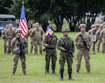 U.S. and Colombian Army Soldiers stand in formation during the closing ceremony of Exercise Southern Vanguard 23 at Tolemaida Military Base, Colombia, Nov. 16, 2022. This year, 48 New York Army National Guard Soldiers will participate in the exercise, which is being held in Brazil.