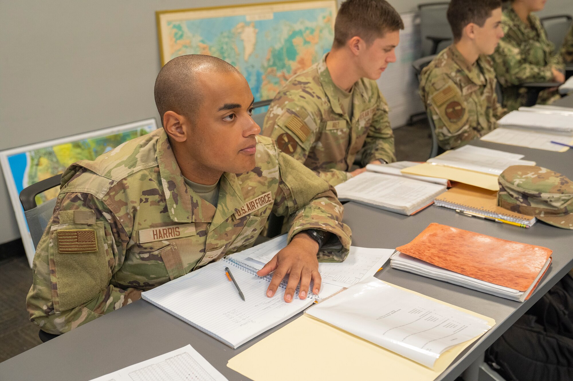 U.S. Air Force Airman 1st Class Carter Harris, 335th Training Squadron weather student, listens to a lecture after taking his appraisals at the Weather Training Complex on Keesler Air Force Base, Mississippi, Oct. 16, 2023.