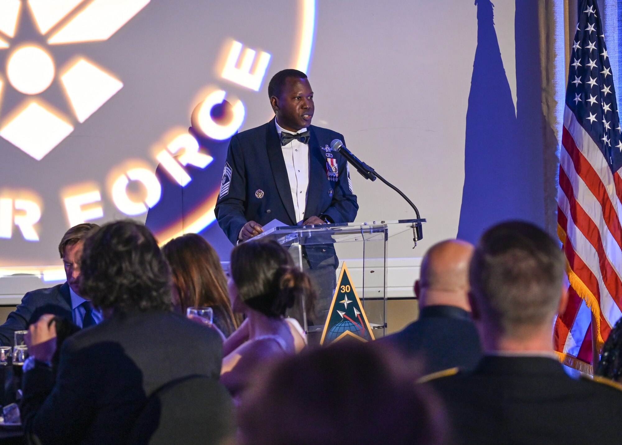 A U.S. Space Force command senior enlisted leader speaks to guests at the 2023 Vandenberg gala.