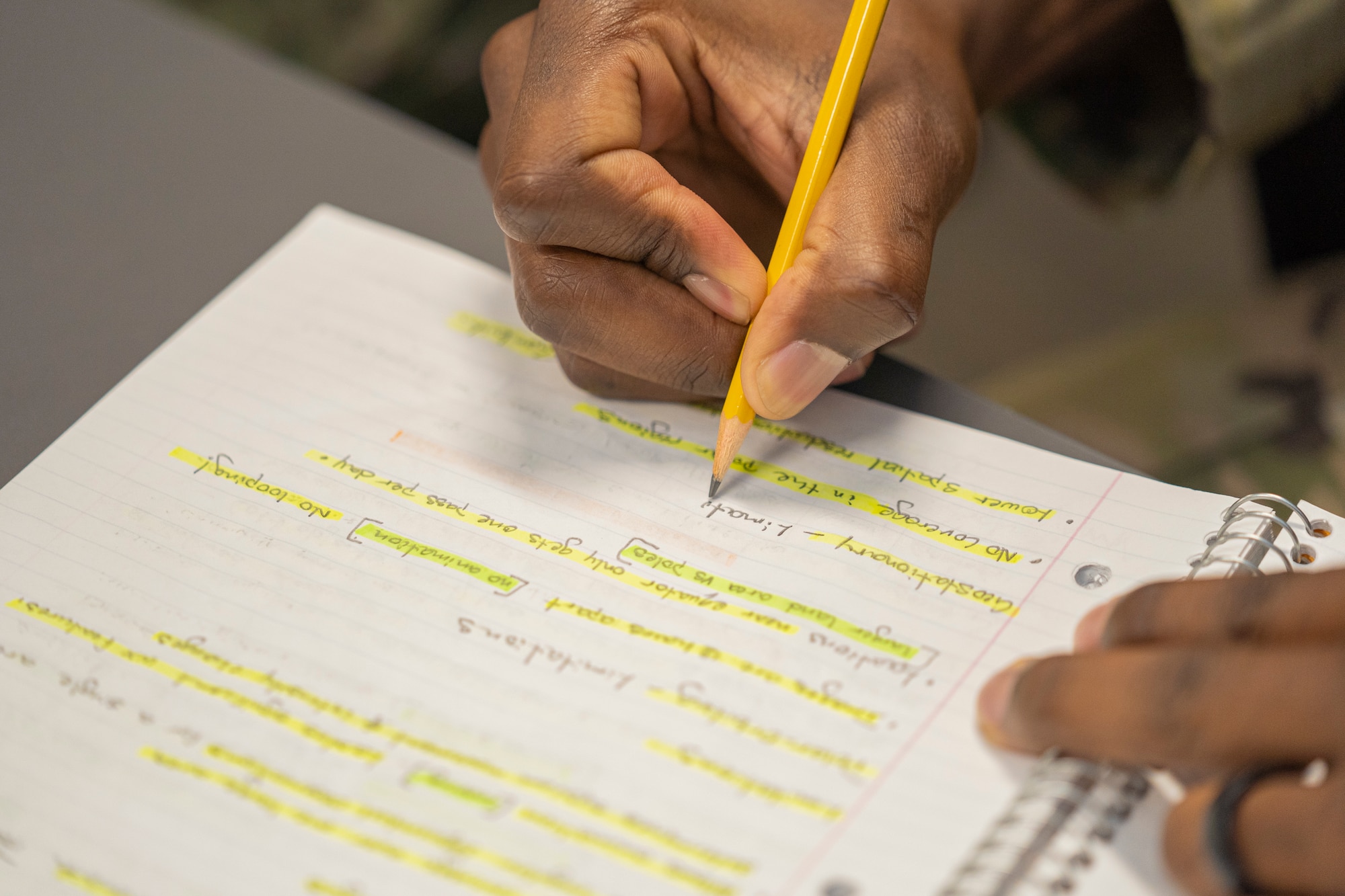 U.S. Air Force Staff Sgt. Lawrence Amsterdam, 335th Training Squadron weather student, takes notes for a review at the Weather Training Complex on Keesler Air Force Base, Mississippi, Oct. 16, 2023.
