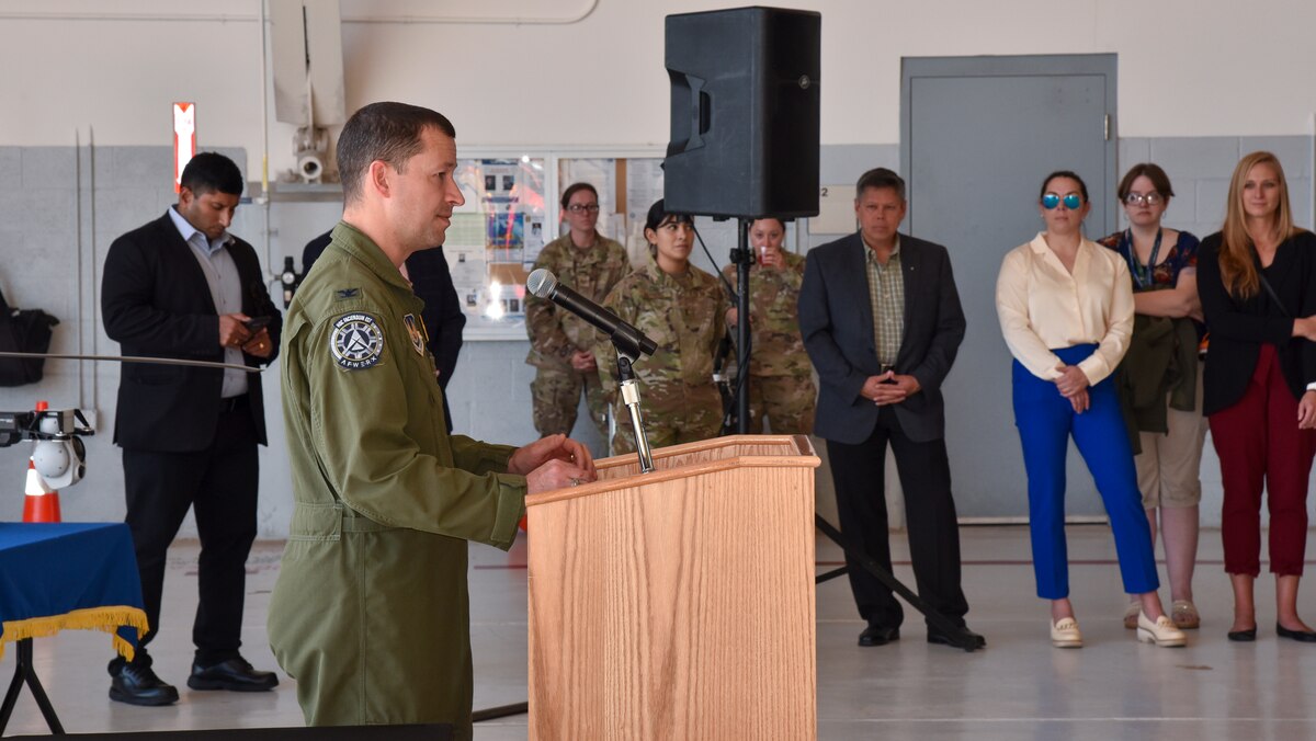 Col. Elliott Leigh, AFWERX director and chief commercialization officer for the Department of the Air Force, gives remarks at the AFWERX and Federal Aviation Administration Memorandum of Understanding signing ceremony at Duke Field, Florida, Oct. 25, 2023.