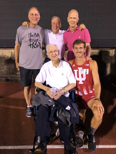 Air Force World Class Athlete Program’s Airman 1st Class Daniel Michalski, front right, poses with his grandfather, Joseph Michalski, front left, and other family members after competing in a collegiate track and field meet. Michalski competed competitively at both Cedarville University in Ohio and the University of Indiana. (Courtesy photo)